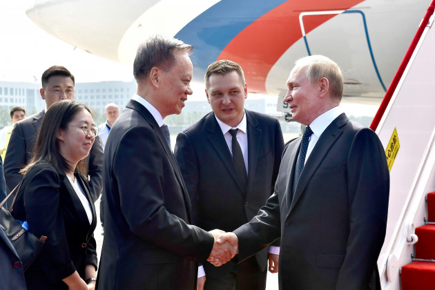 Putin touches down in China to take part in security summit