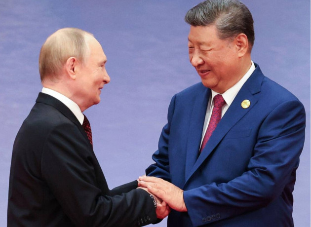 Xi and Putin all smiles before rounding on Western 'bullying' at China summit