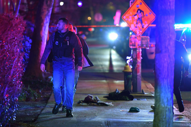Hundreds of police hunt gunman after two killed in Brown University shooting