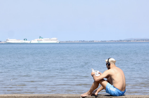 Cooler weather returns after record-breaking heat as rain spreads across Ireland