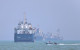 US downs Iran drones targeting ships in Strait of Hormuz, as both insist deal closer than ever