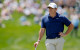 Lowry and McIlroy hit by late setbacks as Poston leads at the Memorial