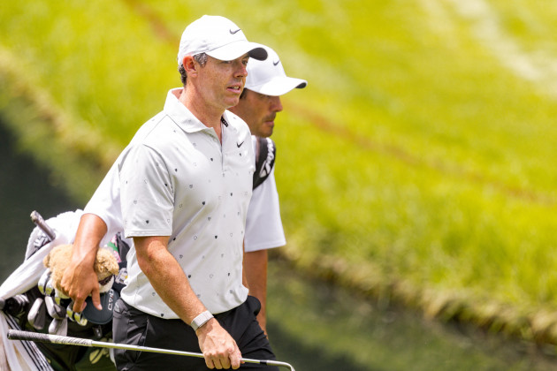 McIlroy and Lowry 8 shots off lead at storm-hit PGA Memorial