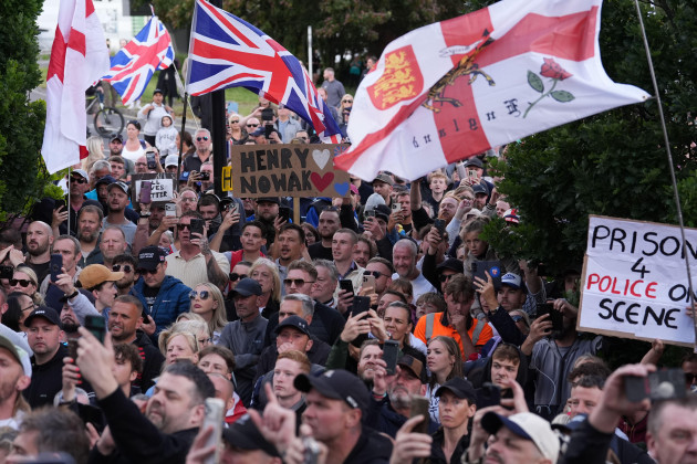 Police in the UK pelted with projectiles at rally over college student's murder