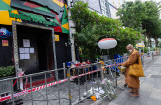 Families claim bodies of Bangkok fire, as toll rises to 30