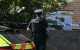 Police remain at the scene after three relatives found dead in family home in Ballymena