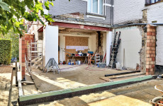 What would it cost to re-do an old, small, extension?