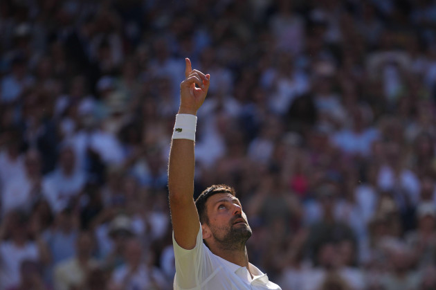 Record-equalling Djokovic powers into Wimbledon last 16