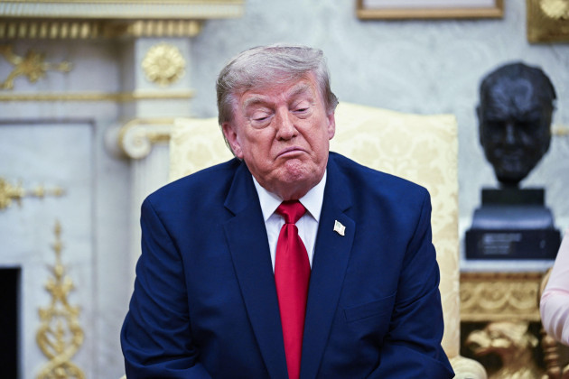 US and Iran launch strikes as Trump reverses threat to tax ships passing through Strait of Hormuz