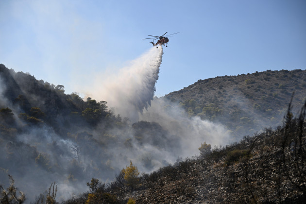 Two dead and hundreds evacuated after wildfires on Greek island